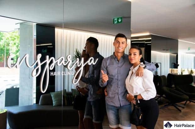 the star and his girlfriend at the Ronaldo hair clinic